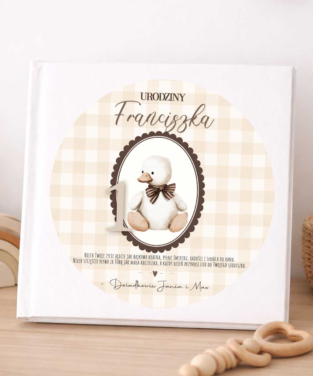 Album na pamiątkę pierwszych urodzin z imieniem Kaczuszka